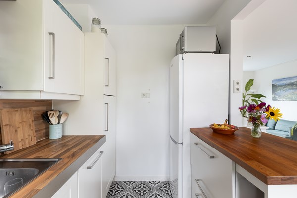 Foto - Te koop: Sfeervolle tussenwoning met groene oase!